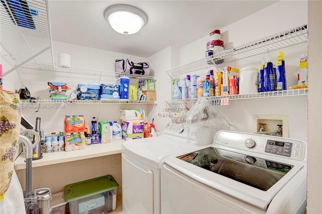 laundry room featuring washing machine and dryer