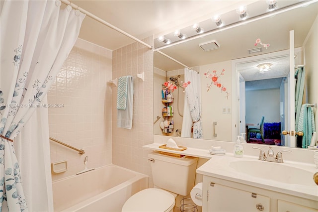 full bathroom featuring toilet, shower / tub combo, and vanity