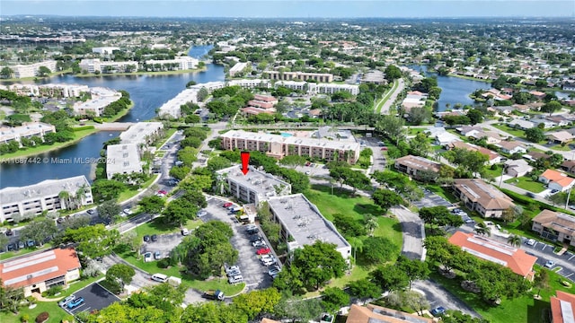 birds eye view of property featuring a water view