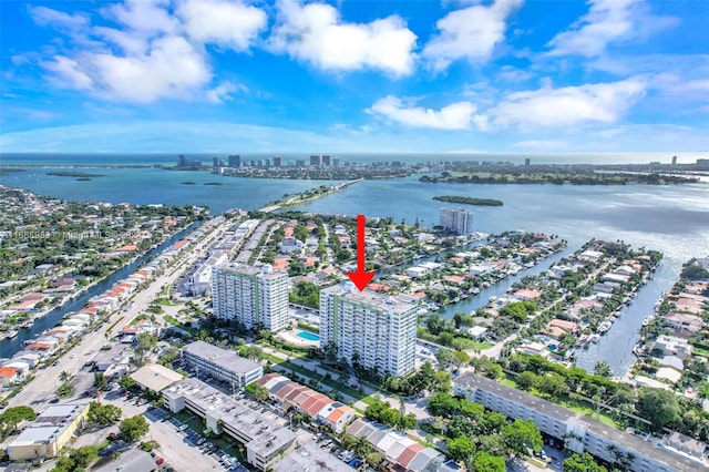 birds eye view of property featuring a water view