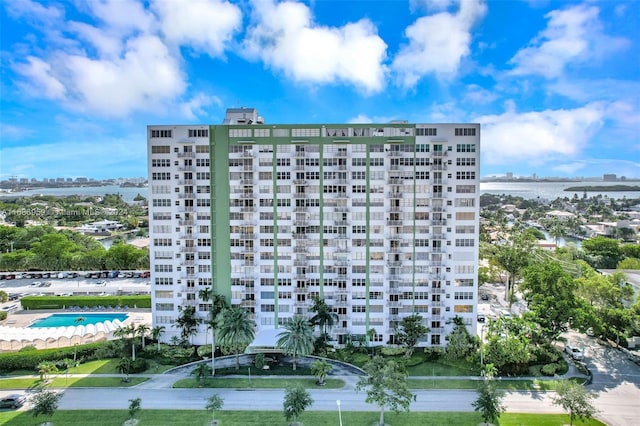 view of building exterior with a water view