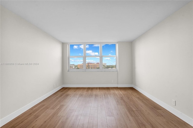 empty room featuring light hardwood / wood-style floors