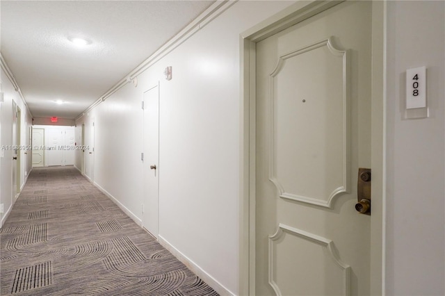 hallway featuring ornamental molding