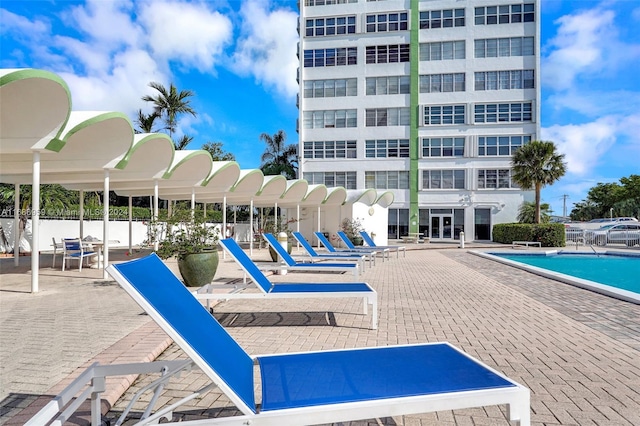 view of pool featuring a patio area