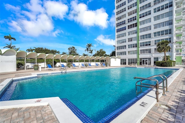 view of pool featuring a patio area