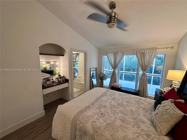 bedroom with connected bathroom, ceiling fan, lofted ceiling, and dark hardwood / wood-style floors