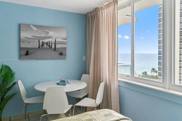 dining room with a water view