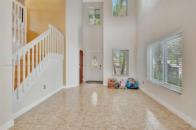 foyer with a high ceiling