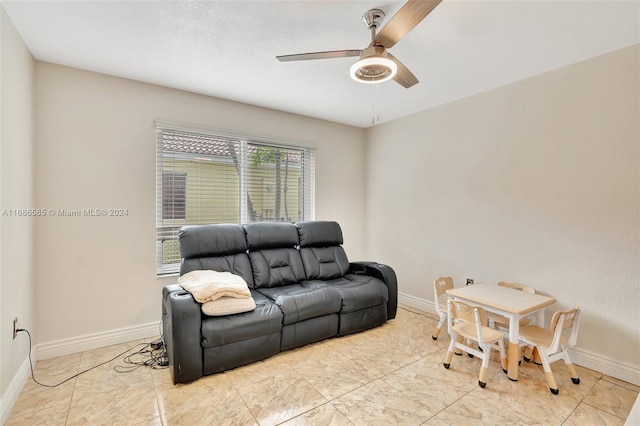 living room with ceiling fan