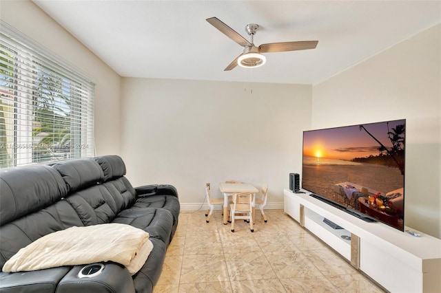 living room with ceiling fan