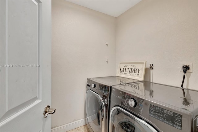 laundry area featuring independent washer and dryer