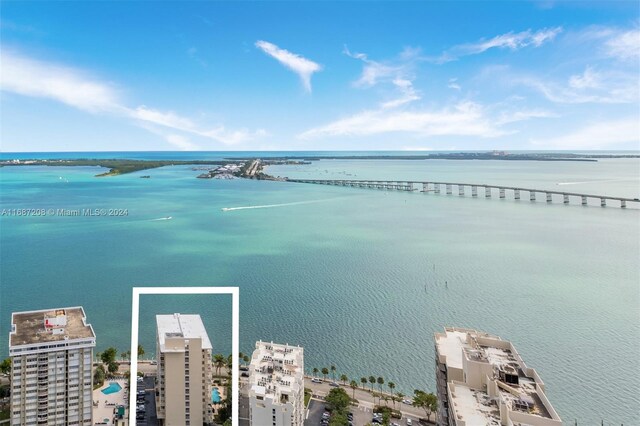 birds eye view of property featuring a water view