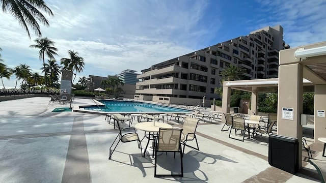 view of pool featuring a patio