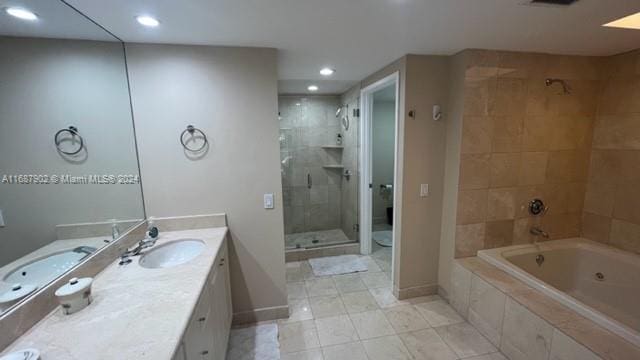 full bathroom with vanity, toilet, tile patterned floors, and separate shower and tub