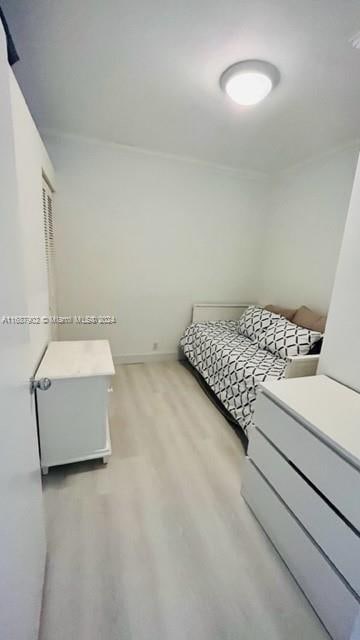 bedroom featuring light hardwood / wood-style flooring