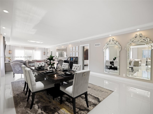dining space with visible vents and recessed lighting