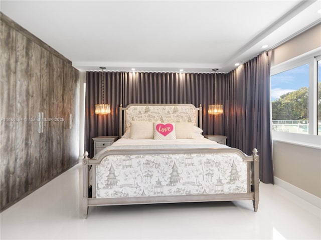 bedroom featuring baseboards and recessed lighting