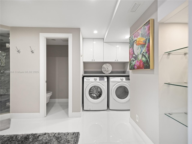 laundry area featuring laundry area, washing machine and dryer, baseboards, visible vents, and recessed lighting