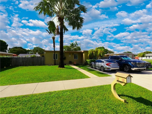 view of front of home with a front yard