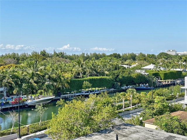 surrounding community featuring a water view