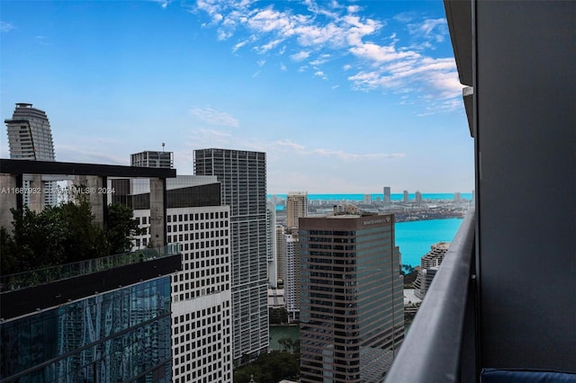 property's view of city with a water view