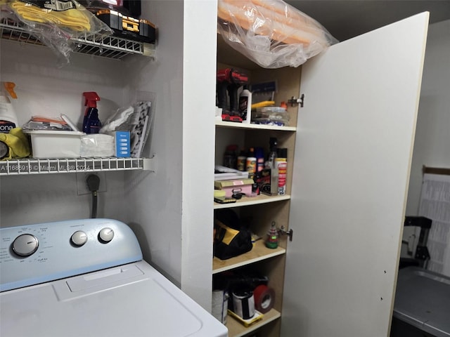 washroom with washer / dryer