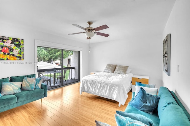 bedroom featuring light hardwood / wood-style flooring, access to outside, and ceiling fan