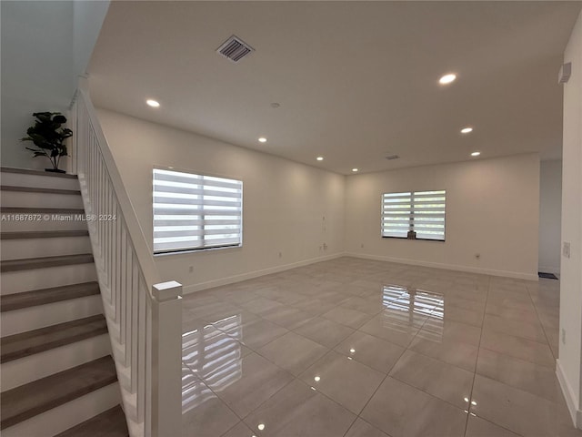 spare room featuring light tile patterned floors