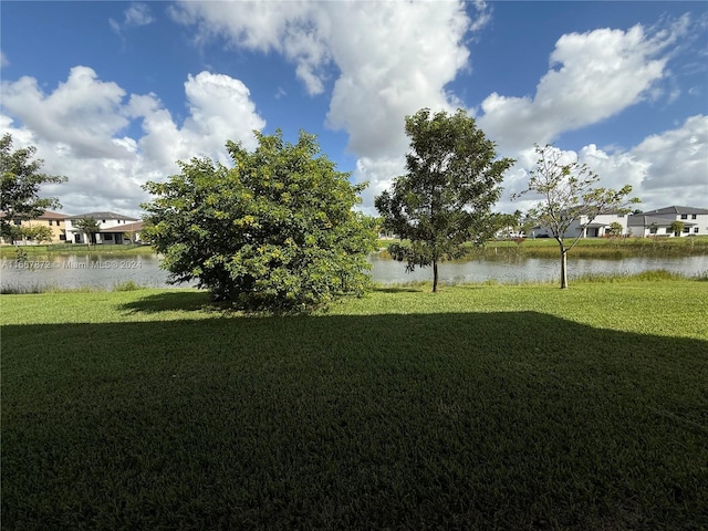 view of yard with a water view