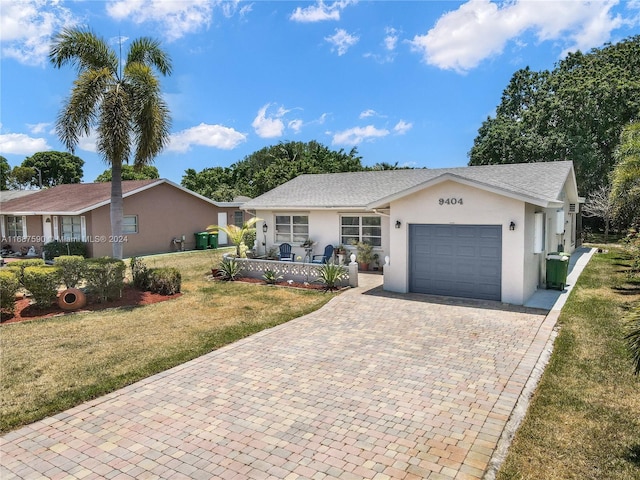 9404 NW 70th Pl, Tamarac, FL 33321 - ranch-style house with stucco siding, a front lawn, a garage, and decorative driveway