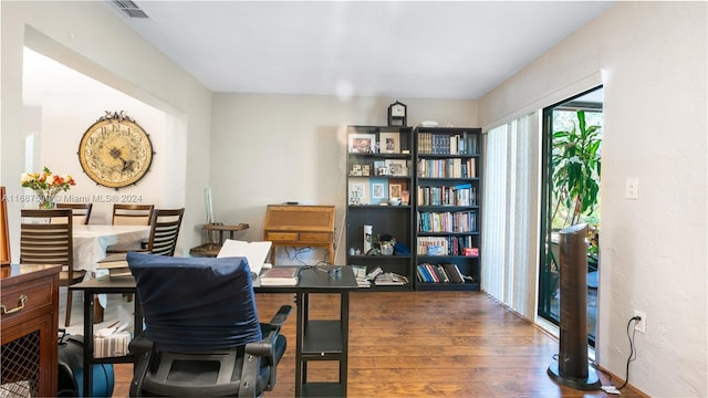 office space featuring dark hardwood / wood-style flooring