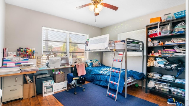 9404 NW 70th Pl, Tamarac, FL 33321 - bedroom with hardwood / wood-style floors and a ceiling fan