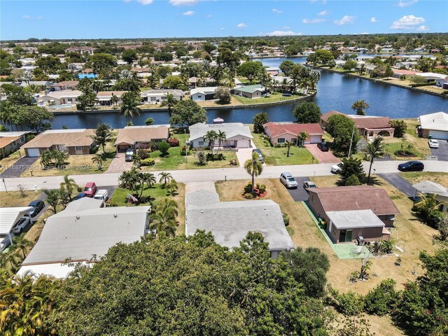 9404 NW 70th Pl, Tamarac, FL 33321 - aerial view of residential area with a large body of water