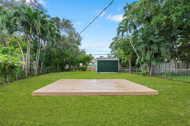 view of yard with a wooden deck