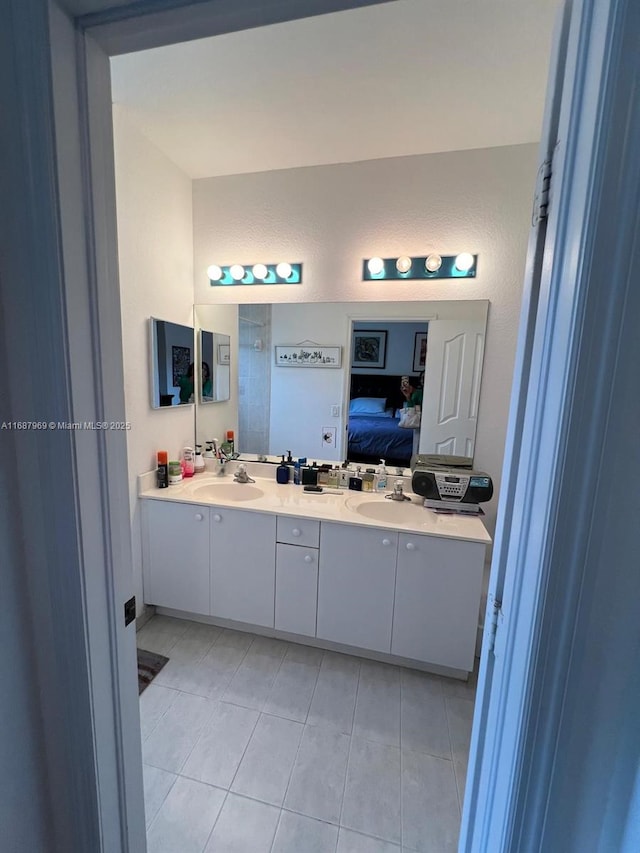 bathroom with vanity and tile patterned floors