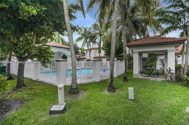 view of swimming pool featuring a gazebo, a lawn, and a patio area