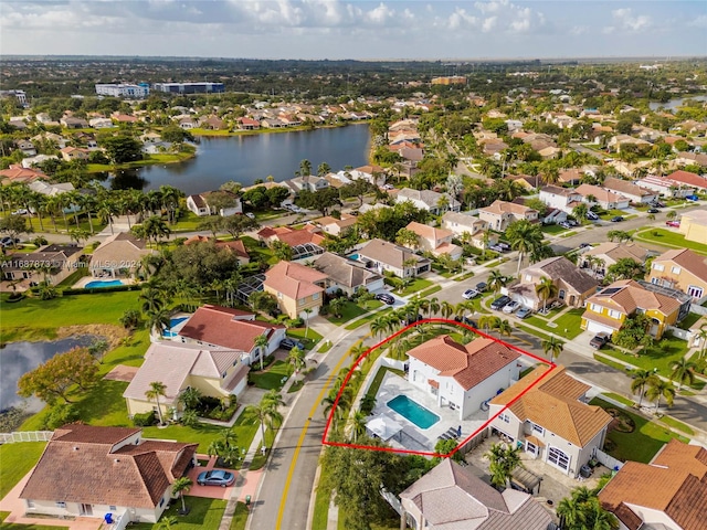 drone / aerial view with a water view