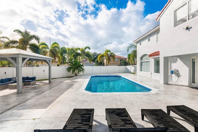 view of pool with a gazebo and a patio area