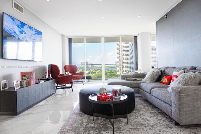 living room with floor to ceiling windows