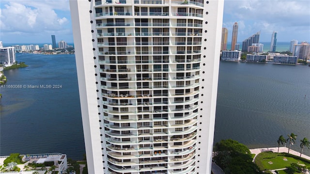 view of building exterior featuring a water view