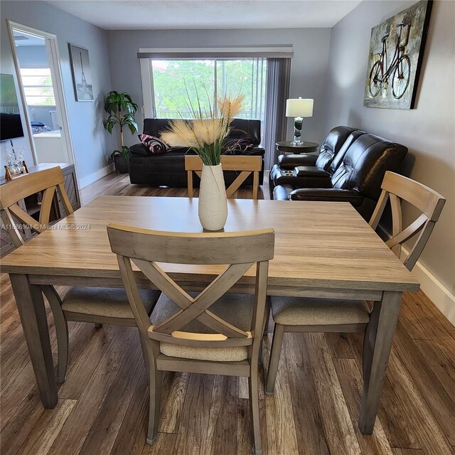 dining room featuring dark hardwood / wood-style floors