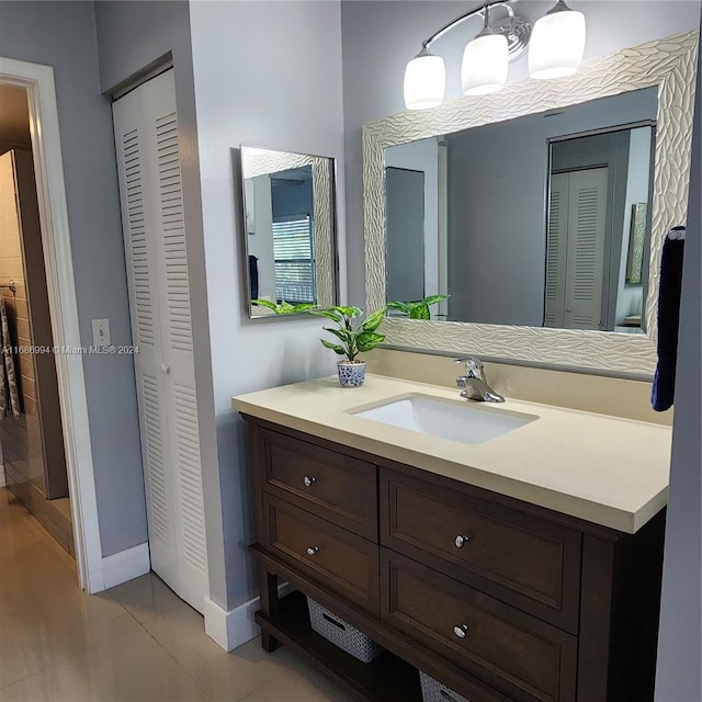 bathroom with vanity and tile patterned floors