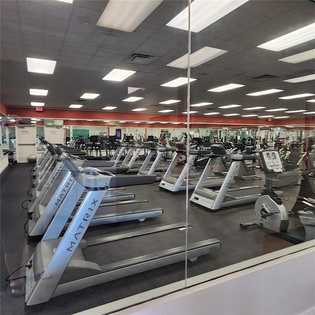 gym with a drop ceiling