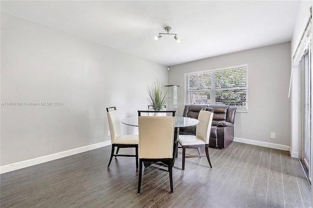 dining area featuring hardwood / wood-style flooring