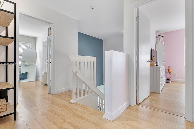 hallway featuring light hardwood / wood-style floors