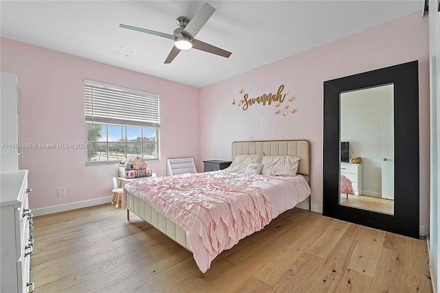 bedroom featuring light wood-type flooring and ceiling fan