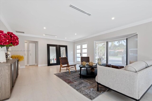 living room featuring ornamental molding