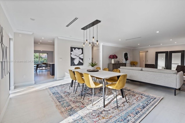 dining room with french doors and ornamental molding