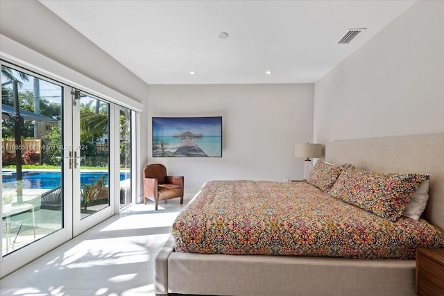 bedroom featuring access to exterior and french doors