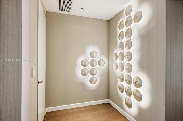 7065 Fisher Island Dr Unit 7065, Miami Beach, FL 33109 - spare room with wood finished floors and baseboards